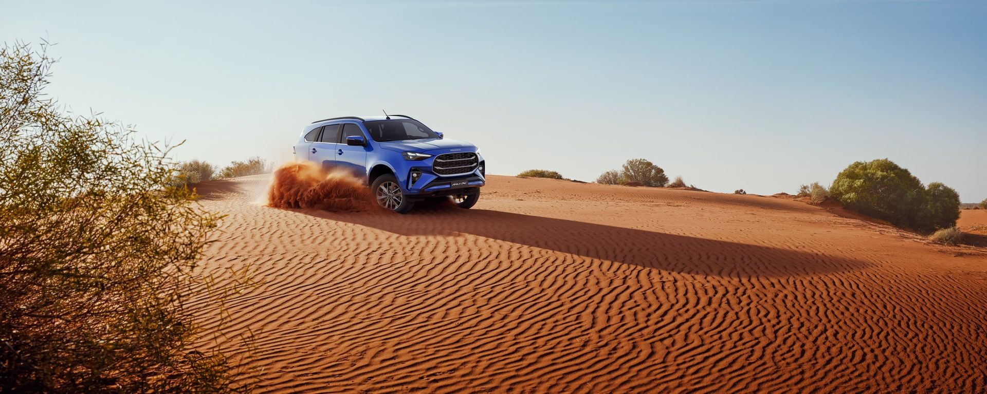 An Isuzu MU-X in the dunes